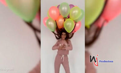 Esta ucraniana de 23 años se roba todas las miradas con su extravagante peinado hecho con una docena de globos de helio